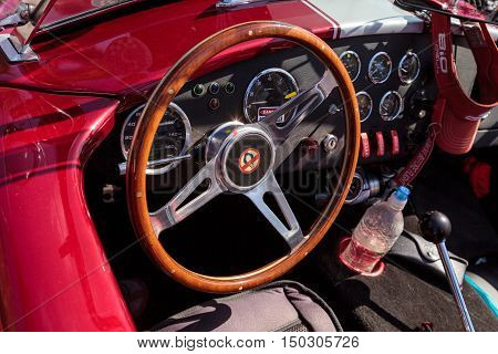 Laguna Beach, CA, USA - October 2, 2016: Red and white 1965 Shelby Cobra owned by Kim Connole and displayed at the Rotary Club of Laguna Beach 2016 Classic Car Show. Editorial use.