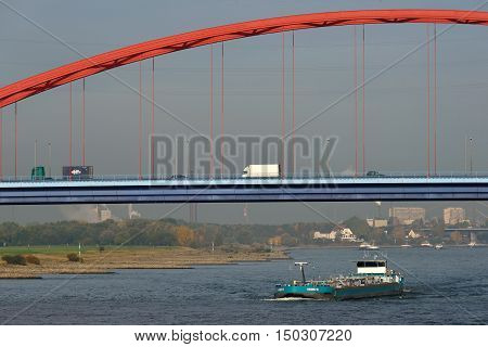 DUISBURG GERMANY - October 26: Barge on the river Rhine on October 26 2015 in Duisburg Germany. Duisburg is the largest river port in Europe (Duisport)