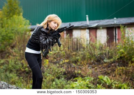 Nice Girl With Arms In Autumn Day