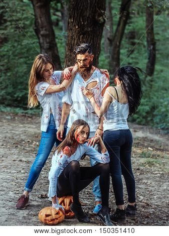 Halloween People With Pumpkin And Blood