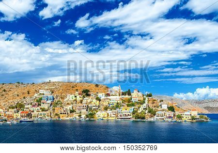 Greece. Dodecanesse. Island Symi Simi . Colorful houses on the rocks