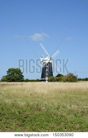 BURNHAM OVERY STAITHE, UK - AUGUST 30, 2016: The tower Windmill, built in 1816 was used as a corn ill until damaged by a storm, Norfolk, UK