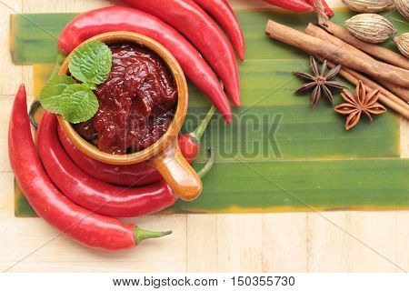Korean red pepper gochujang for cooking on wood background on wood background
