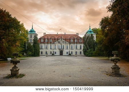 Nieborow Poland - September 30 2016: Entrance to Radziwill family palace of Nieborow in baroque style surrounded by a french garden.