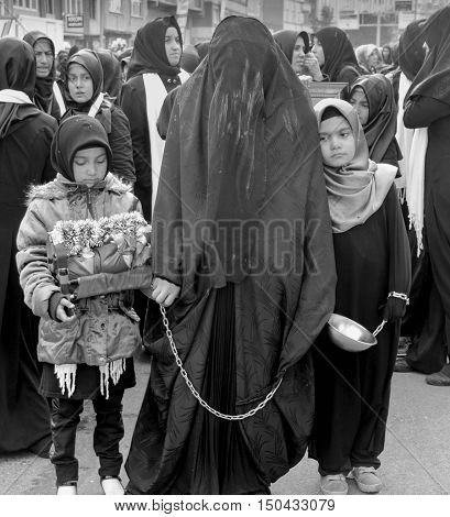 Istanbul Turkey - November 3 2014: Mourning of Muharram in Turkey. A Universal Ashura Mourn Ceremony was held in Istanbul to commemorate the martyrdom of Husain ibn Ali the grandson of the Prophet Muhammad and his 71 friends.