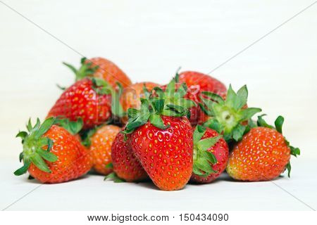 Group Of Of Red Ripe Strawberry Fruit On Wooden Board (also Known As Fragaria Strawberry, Fragaria A