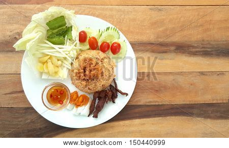 rice with fried mackerel boil egg shrimp paste chili sauce and vetgetable and pig fried original thai food