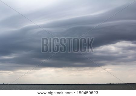 Asperatus-undulatus dark clouds in the stormy sky