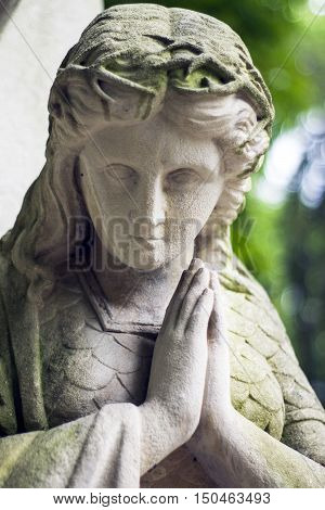 Old statues on the graves and gravestones in the Lychakiv Cemetery