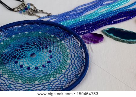 set for making a Dreamcatcher beads thread on a white background