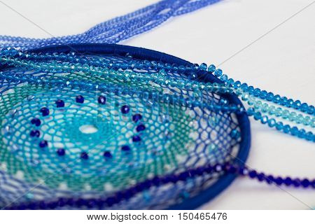 set for making a Dreamcatcher beads thread on a white background