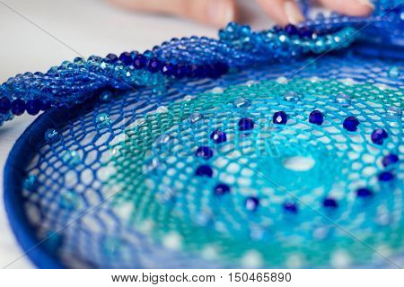 set for making a Dreamcatcher beads thread on a white background