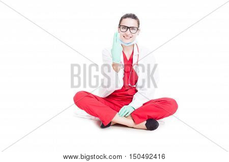 Happy Female Medic Showing Two Fingers