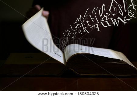Text Flying out of an old book