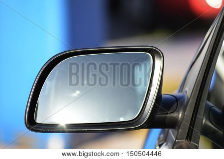 empty side rearview mirror on a car concept with copy space