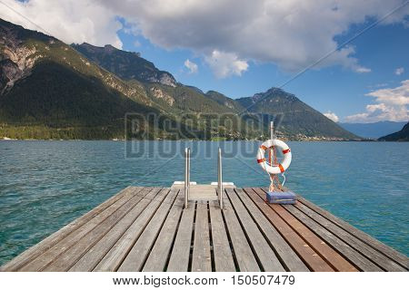 Achensee ( Lake Achen) wooden stairway on lake (Austria).