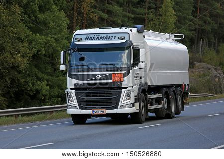 ORIVESI, FINLAND - SEPTEMBER 1, 2016: White Volvo FM tank truck of Kuljetus Hakamaki Oy on the road. The ADR code 33-1203 signifies gasoline.