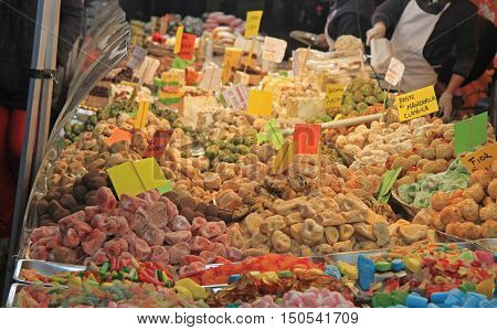 stand with sweets at the christmas fair in Udine Italy