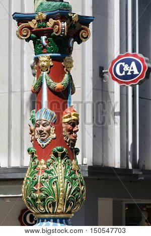 LUCERNE SWITZERLAND - MAY 06 2016: Pillar That is most colorful detail of the Fritschi Fountain makes it one of the most interesting tourist attractions amongst fountains