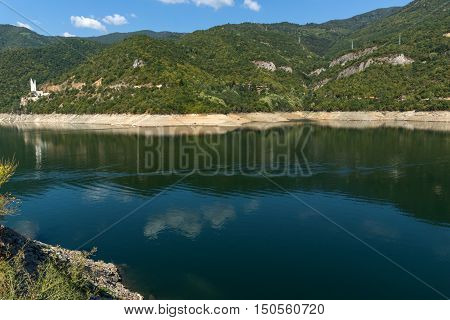 Green forest around Vacha (Antonivanovtsy) Reservoir, Rhodopes Mountain, Bulgaria