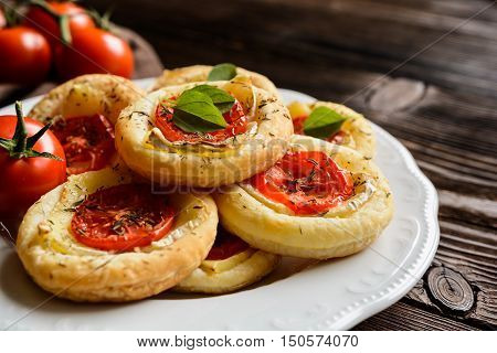 Mini Pizzas With Camembert And Tomato