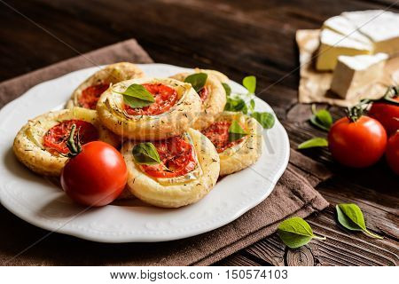Mini Pizzas With Camembert And Tomato