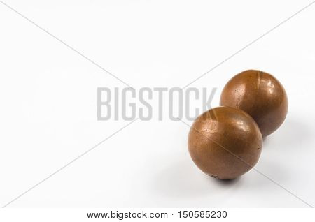 pair of copper Chinese singing balls Baoding of health for hands on white background