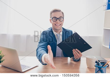 Happy Businessman Giving Hand For Handshake To Make Finansial Deal