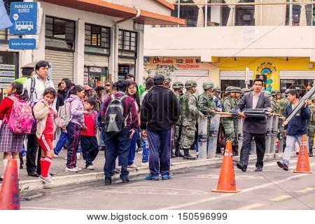 Banos De Agua Santa Ecuador - 23 June 2016: Enthusiasts Supporters Waiting For Ecuadorian President Rafael Correa To Visit Banos De Agua Santa Ecuador South America
