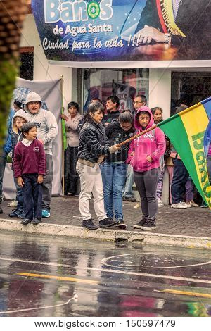 Banos De Agua Santa Ecuador - 23 June 2016: Group Of Families Waiting For The President Rafael Correa To Entering In Banos De Agua Santa Ecuador South America