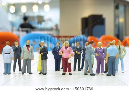Small Figures Of Business Meeting