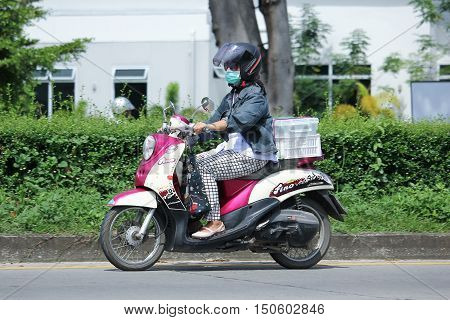 CHIANGMAI THAILAND - OCTOBER 2 2016: Private Yamaha Fino Motorcycle. Photo at road no.121 about 8 km from downtown Chiangmai thailand.