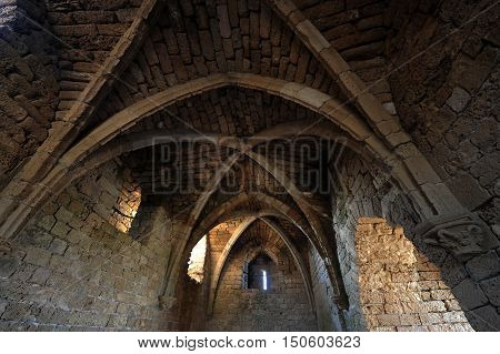 Crusader arch of old fortress castle in Caesarea National park on August 13 2009 in Caesarea Israel.