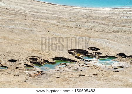 Aerial landscape view of Sinkholes in the Dead Sea Israel.