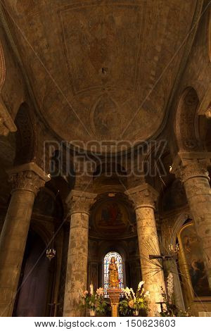 Poitiers France - September 12 2016: Very old church Notre Dame la Grande in Poitiers in France inside the statue of the Virgin Mary with Jesus and the keys to the city