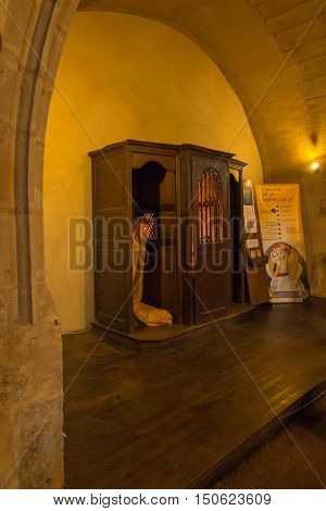 Poitiers France - September 12 2016: Part of the interior of the church of Saint-Porchaire in Poitiers France. Confessional in which confessed St. Louis Monfort