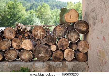 Stacked firewood
Chopped and stacked wood drying out in the sun in Spain