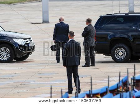 BELGRADE, SERBIA - AUGUST 16th, 2016: Security officers protects car with VIP person, on August 16th in Belgrade