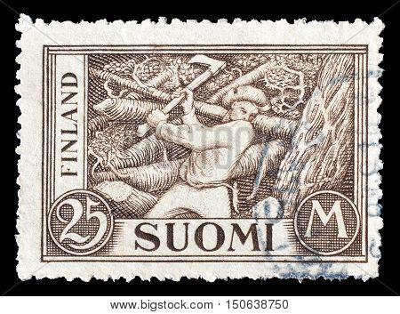 FINLAND - CIRCA 1930 : Cancelled postage stamp printed by Finland, that shows Woodchopper.