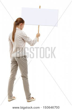 Back view woman showing sign board. man holds information plate. Rear view people collection. backside view of person. Isolated over white background. A girl in a gray jacket holding a pointer in his