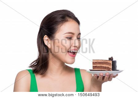 Beautiful smiling asian young woman with a chocolate cake isolated on white background.