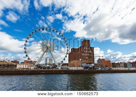 Gdansk Poland - October 04 2016: Ferris wheel on the Motlawa River waterfront in old city of Gdansk
