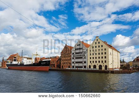 Gdansk Poland - October 04 2016: Old historic buildings of the old city on the Motlawa River waterfront in Gdansk