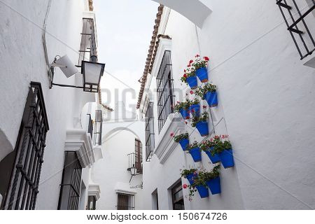 BarcelonaSpain - January 13, 2016: Spanish town (Poble Espanyol) - architectural museum under the open sky. The museum features exhibits on contemporary art with streets houses parks theater school restaurants and artisan workshops.