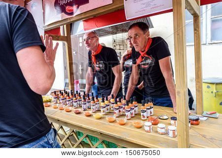 Ljubljana Slovenia - September 17 2016: 2nd Chili - Hot Pepper Festival Fair in Lepa Zoga. Different Hot Sauce makers present their products to the public. Fotrovi ciliji hot sauce.