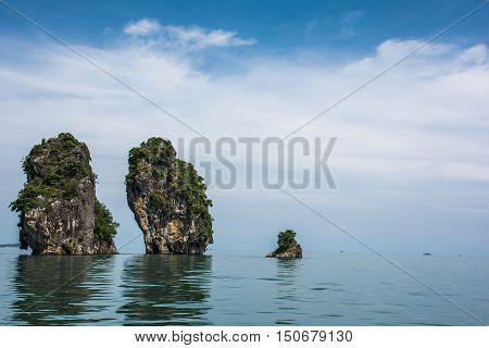 Koh Songpeenong Island strange shapes island in the Andaman Sea near Naka Island with beautiful sky and cloud formation