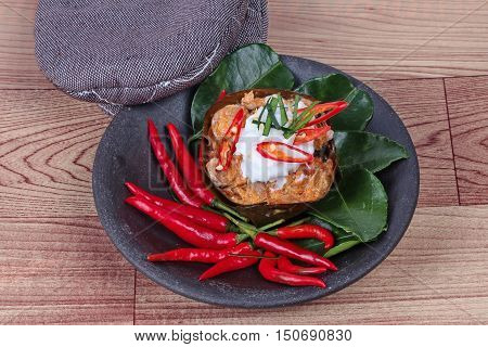Streamed vegetable curry in banana leaf cup call 