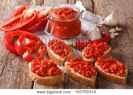 Traditional Balkan Ajvar From Peppers With Garlic Close-up. Horizontal