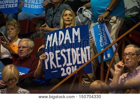 Harrisburg PA USA - October 4 2016: Supporter holding a Madam President 2016 sign at the rally for Presidential candidate Hillary Clinton.