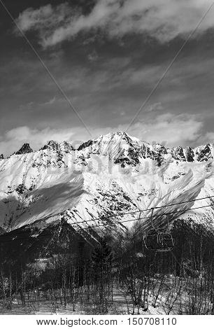 Black And White Ski Lift In Snow Mountains At Nice Winter Day